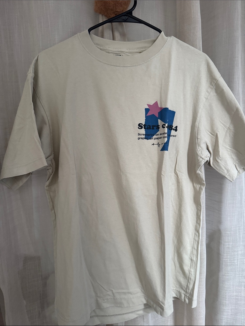 Uniqlo Beige Short Sleeve Tee with Pink & Blue Star Graphic